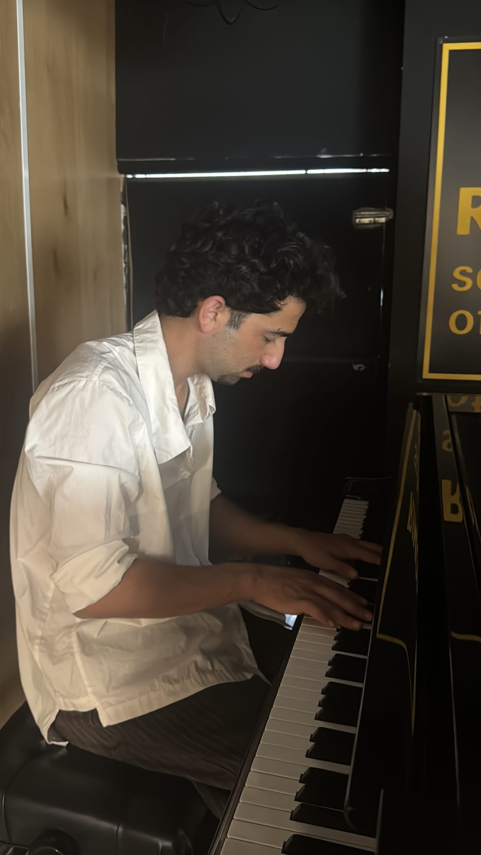 Noam Shaty playing the piano